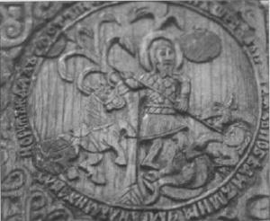 Воин (предп. — св. Георгий) поражающий дракона. Деталь резного деревянного креста из Новгородского музея, датируемого 1359 г. (Osprey)